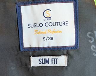Closeup of Suslo Couture Christmas Corgi dog sport coat blazer, slim fit, size S/38