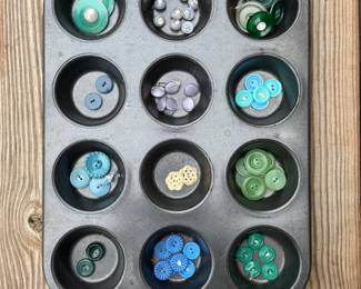 You'll find a sweet selection of fancy buttons of all kinds at this estate sale (along with a dressmaker's form, boxes of threads and sewing supplies, books about sewing, and more!)