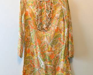 A vintage 1970s Bobbie Brooks orange, yellow and green paisley print long sleeve mini dress