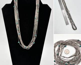 A Native American sterling silver multi strand "liquid" silver and turquoise bead necklace