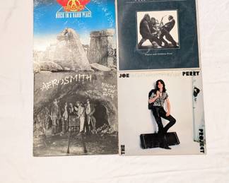 Vinyl LP records Aerosmith / Rock in a Hard Place, Van Halen / Women and Children First, Aerosmith / Night in the Ruts, The Joe Perry Project / I’ve Got the Rock’n’Rolls Again