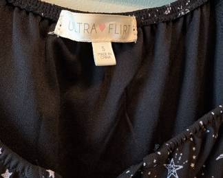 Closeup of Ultra Flirt Sun, Moon and Stars little black dress, size S