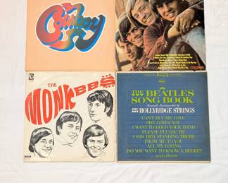 Old vinyl record album LPs by The Monkees, Beatles Song Book by The Hollyridge Strings