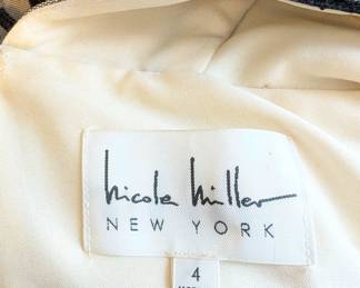 Closeup of Nicole Miller NY black eyelet lace V-neck mini dress size 4