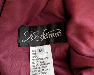 Closeup of La Femme jewel tone jersey formal gown with sheer lace bodice, size 8