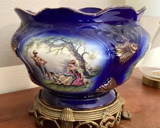 #81  $110 - American planter on brass stand, blue porcelain w/painted figure, 1940's.