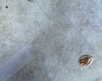 #J110- $155 - Citrine pear shaped earrings on 10kt yellow gold rope mount. 1.4gr