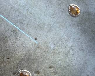 #J110- $155 - Citrine pear shaped earrings on 10kt yellow gold rope mount. 1.4gr