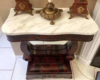 #7 - $500 - Antique Empire mahogany hall console or petticoat table with mirror back & marble top.