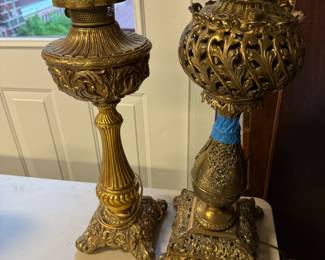 #101 - $120 - Two bronzed oil lamps electrified.