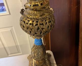 #101 - $120 - Two bronzed oil lamps electrified.
