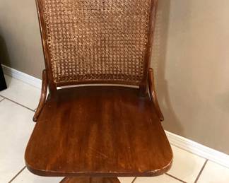 #35 - $120 - American oak desk chair, swivel, cane back.