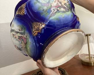 #81  $110 - American planter on brass stand, blue porcelain w/painted figure, 1940's.