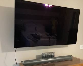 #77 - $200 - TV, LG OLED 55" with stand, 2021.