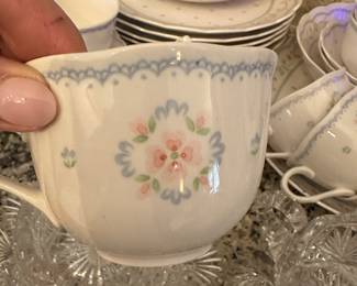 #142 - $120 - American Country Dena dishes, 8 dinner plates, 10 salad plates, 8 saucers, 7 cups, 1 large serving bowl, 2 small serving bowls, sugar & creamer, 1 oval serving plater