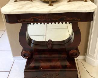 #7 - $500 - Antique Empire mahogany hall console or petticoat table with mirror back & marble top.