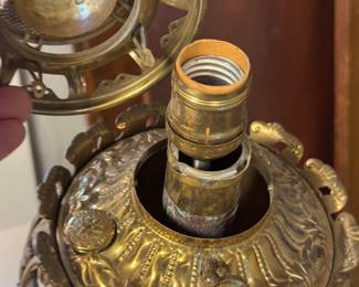 #101 - $120 - Two bronzed oil lamps electrified.