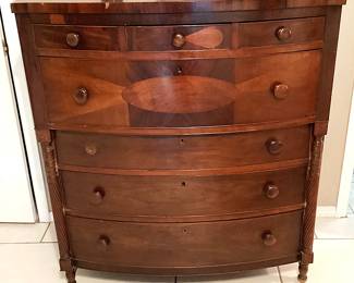 #75 - $450 - American bowfront mahogany 41 1/2x24x47H, some veneer loss.