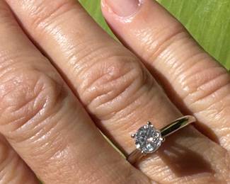 #J18 - size 6 3/4 - 0.81 ctw round diamond on 14kt white gold. 5.7mm. I1 to I2 clarity - H color - 2.5gr.