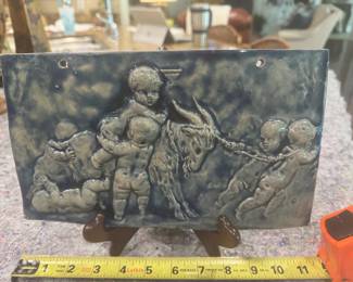 #116 - $80 - Italian grey glazed pottery tile with children pulling goat, 11x6".