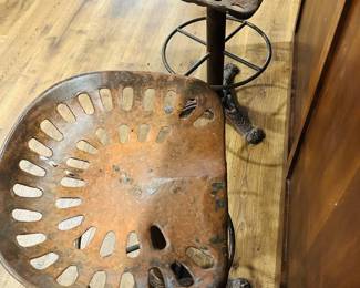 Cast Iron Tractor Seat Stools. 5 Available. They are amazing.