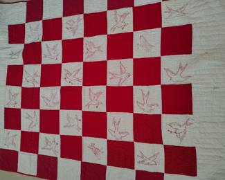 Great antique quilt with swallows.