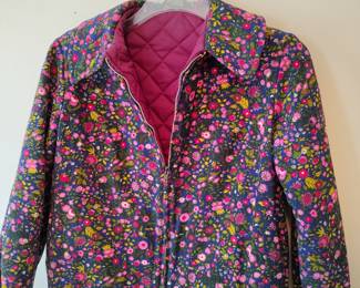Holy cow look at that vintage floral jacket from the 60s .
