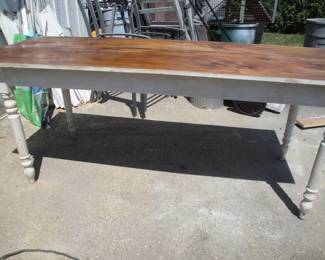 Farm table scrubbed pine top with a clear finish and worn old white paint on country Sheraton turned legs and apron $395.