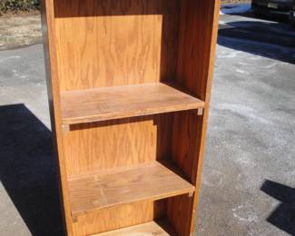 Narrow solid oak bookcase $20