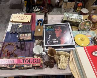 Elvis record collection in frames.