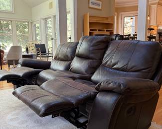Reclining leather sofa