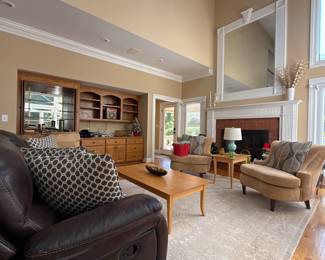 Leather reclining sofa, pair of chairs, coffee & side table. Multiple pillows