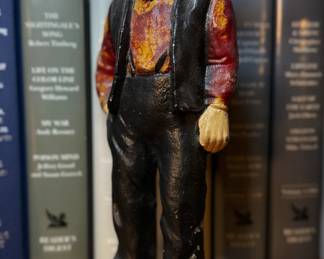 Vintage cast-iron figurine of an Amish man