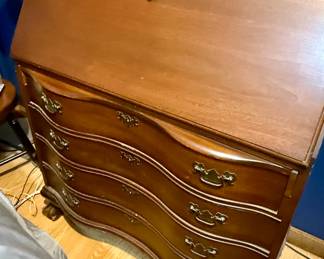 Serpentine Desk with Slant Front Top and Four Drawers