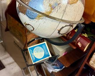 Replogle globe on metal stand