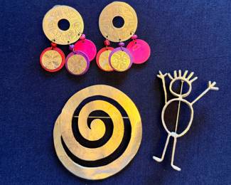 Earrings and Modernist brooches