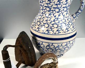 Two sad irons and blue and white pitcher