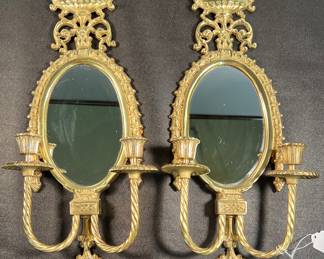 Pair of brass two-candle mirrored sconces