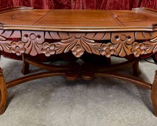 Ornate carved coffee table