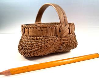 Vintage handwoven miniature basket