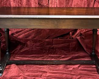 Dark wood piano bench