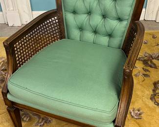 Canned and upholstered occasional chair