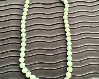 Jade necklace with 14K gold clasp marked “Ming”