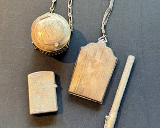 Silver accessories, including an Italian silver lighter (L) and a silver Waterman pen (R)