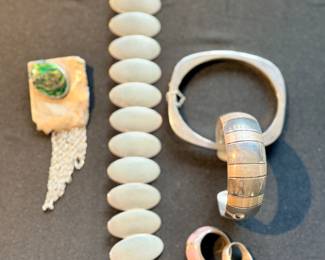 Sterling silver bracelets, cuffs, brooches, and earrings (MANY)