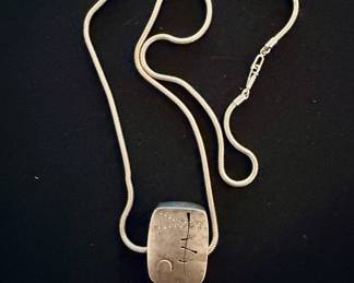 Handcrafted and signed necklaces