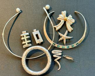 Sterling silver chokers, pendants, and brooches
