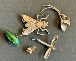 Insect brooches, in sterling, enamel, and semi-precious stones
