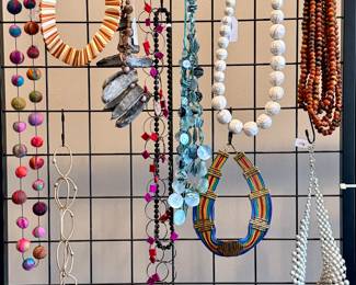 Many handcrafted, artisanal necklaces