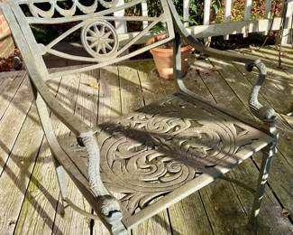 Star and Dolphin cast aluminum arm chair. 